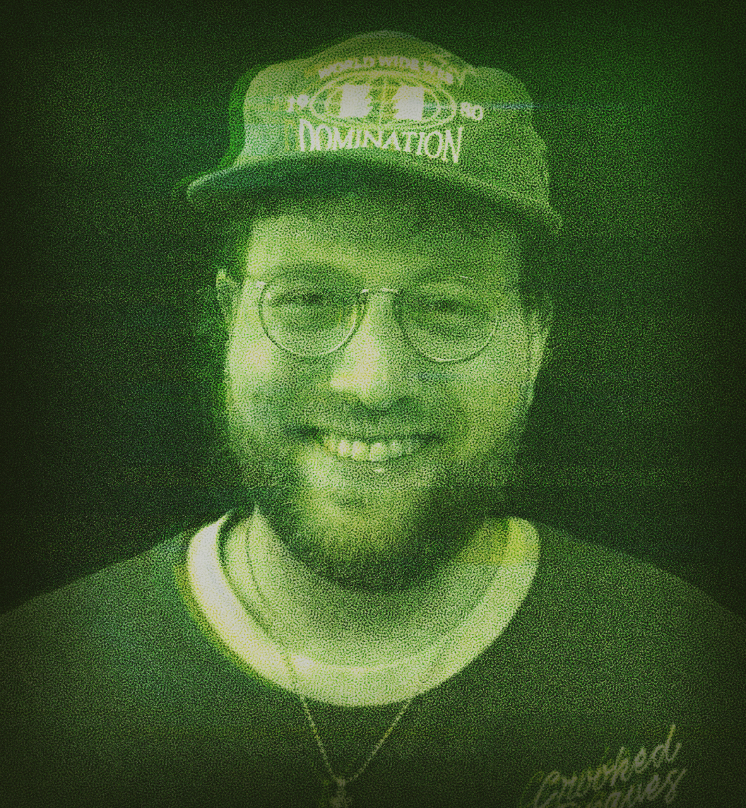 A photo of me, Ian Mintz, with a green effect.